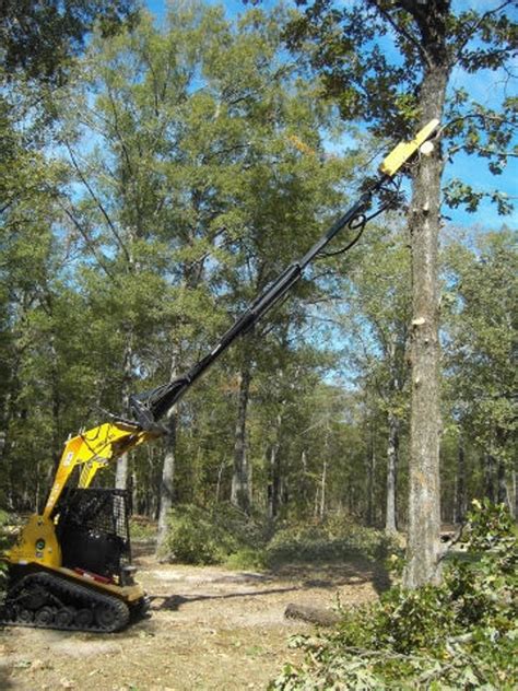 skid steer tree saw with grapple|skid steer limb trimmer attachment.